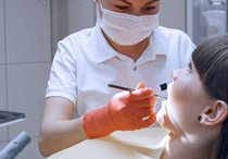 Cara Menghilangkan Karang Gigi