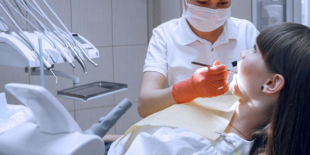 Cara Menghilangkan Karang Gigi